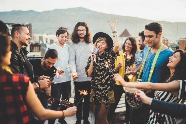 istock Friends celebrating New Year on rooftop party 1087618842