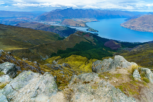 hiking the ben lomond track with views of lake wakatipu in the mountains of queenstown, southern alps, otago, new zealand