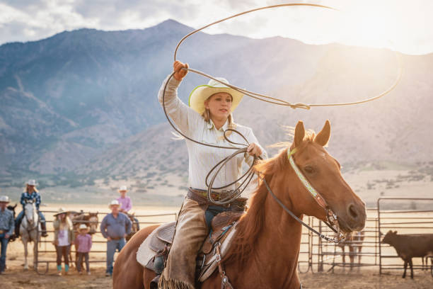 istock Cowgirl throwing Lasso in Rodeo Training 1087636138