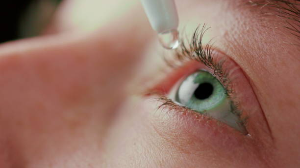 close-up beautiful blue eye - sensory perception eyeball human eye eyesight imagens e fotografias de stock
