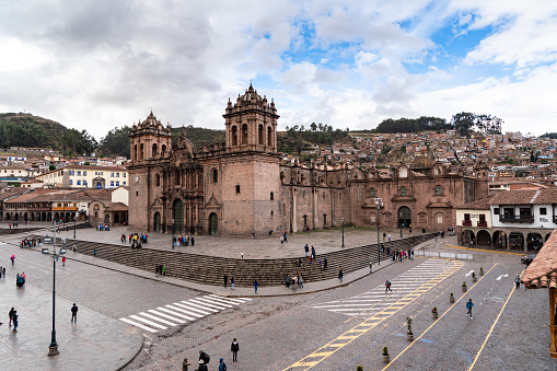 Cusco, Peru - October 14, 2018: Plaza de Armas, the town center of the city of Cusco, Peru. Tourists walking around the busy square.