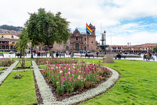 Cusco, Peru - October 14, 2018: Plaza de Armas, the town center of the city of Cusco, Peru. Tourists walking around the busy square.