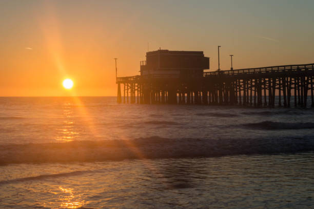 istock Sun sets over the ocean in Newport Beach, CA 1087651940