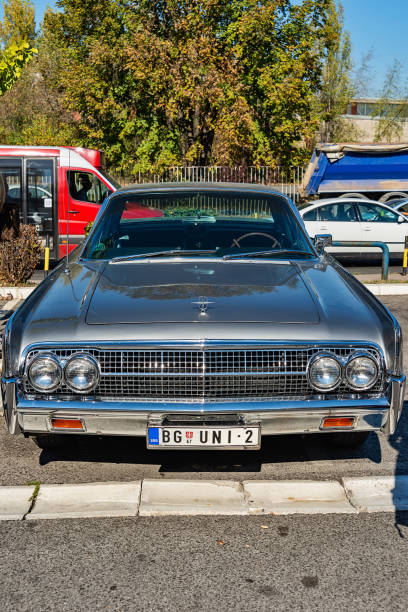 Belgrade, Serbia-October 13, 2018: An oldtimer exhibition in the parking lot in front of the Rakovica Municipality in Belgrade, Serbia. Lincoln Continental [JOHN NAISBITT] from 1963.