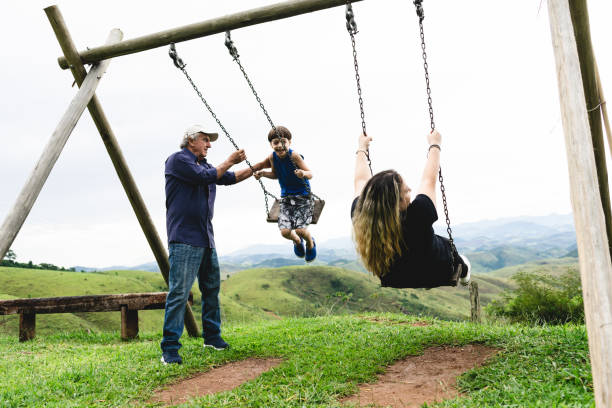 istock Grandfather, grandson and daughter having fun 1087659336