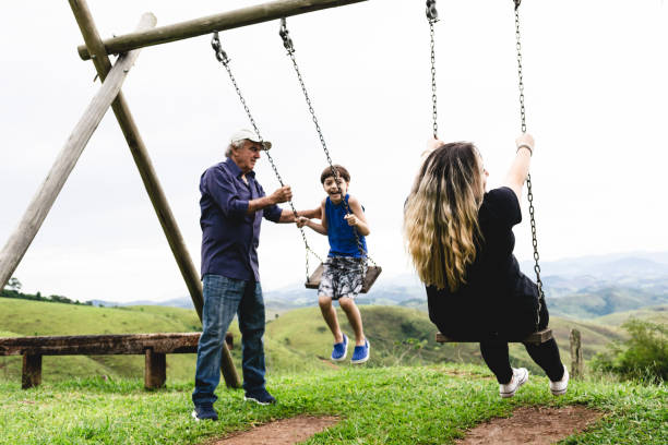 istock Grandfather, grandson and daughter having fun 1087659340