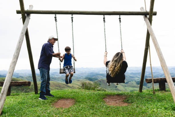 istock Grandfather, grandson and daughter having fun 1087659358