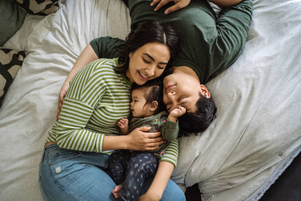 istock Toddler and her parents 1087664612