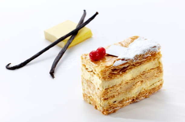 istock Delicious napoleon cake on white background 1087668232