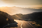 istock Highway at sunrise, going into Death Valley National Park 1087673356