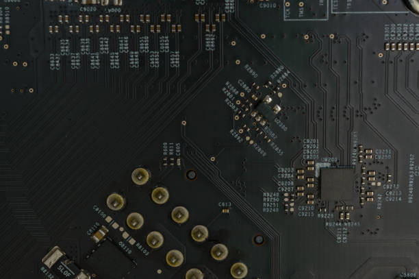 istock Silicon Motherboard with Solder Close-up 1087680564