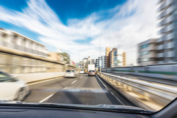 Car running on a highway Car running on a highway drivers seat stock pictures, royalty-free photos & images