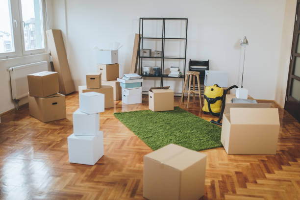 istock Carton box-filled new unpacked apartment 1087695716