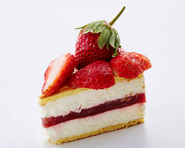 istock Beautiful cake cut pieces on a white background 1087708652