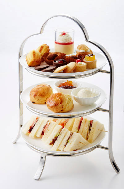 istock Delicate and delicious afternoon tea pastry mix on a white background 1087710246