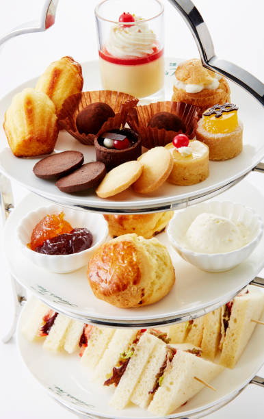 istock Delicate and delicious afternoon tea pastry mix on a white background 1087710250