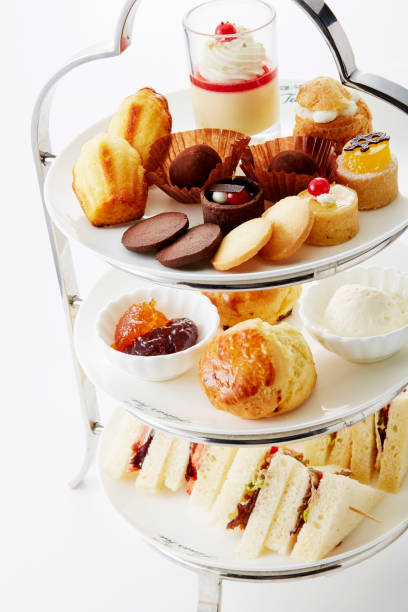 istock Delicate and delicious afternoon tea pastry mix on a white background 1087710254