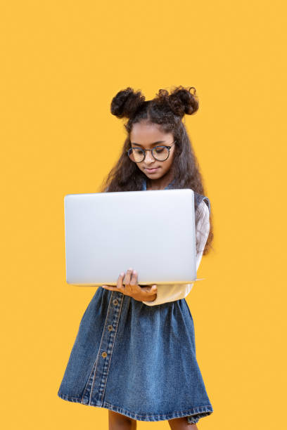 istock Cute nice girl using her new laptop 1087713550
