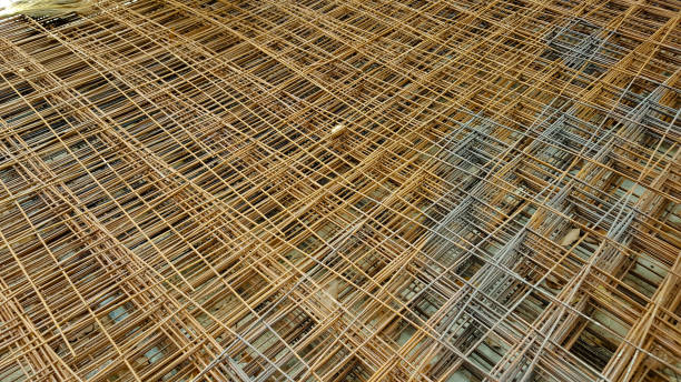istock reinforcing mesh, steel bars stacked for construction 1087726988