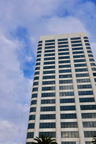 istock Tall Buildings with Vertical Line Exteriors 1087744362