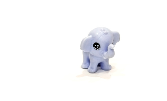 pictured in the photo Handmade elephant toy isolated on white