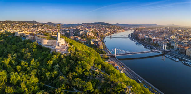 Budapest, Hungary - Aerial panoramic skyline view of Budapest at sunrise. This view includes the Statue of Liberty, Elisabeth Bridge and Szechenyi Chain Bridge stock photo