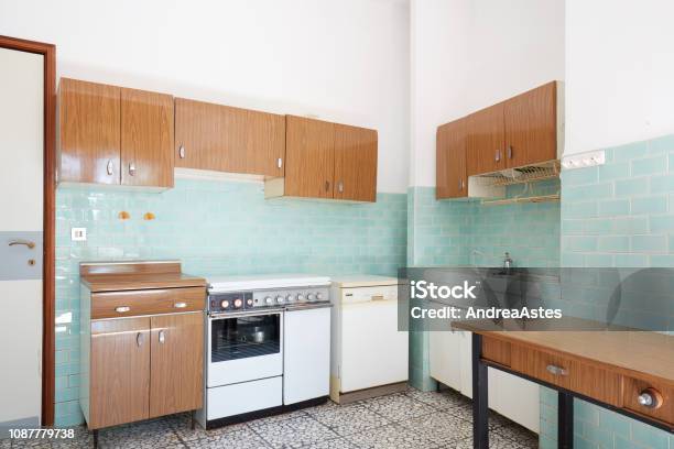Old Kitchen Interior With Turquoise Tiles In Old House Stock Photo - Download Image Now