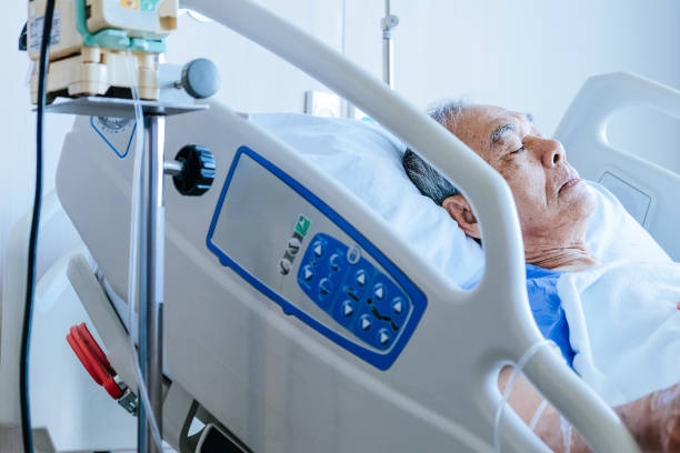 istock Elderly patients in hospital bed 1087786256
