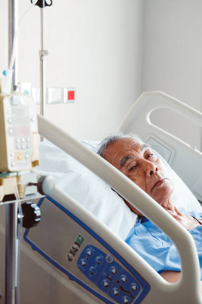istock Elderly patients in hospital bed 1087787752