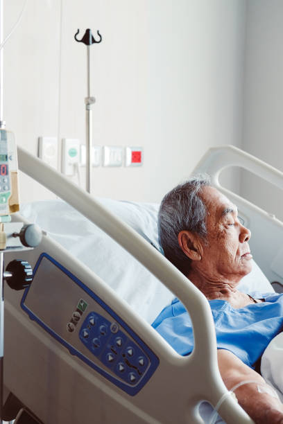 istock Elderly patients in hospital bed 1087787756
