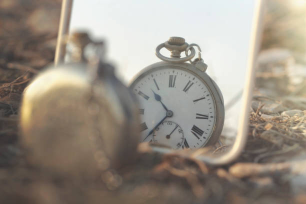 istock surreal image of an antique clock that is mirrored 1087788100