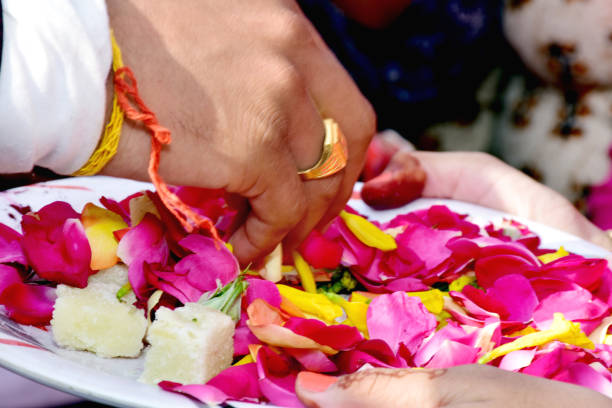 istock Cutting Ribbon in Indian Wedding Ritual Welcome Ceremony 1087789780