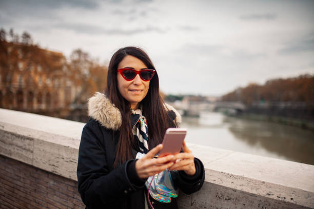 istock Woman texting message with smart phone 1087797754
