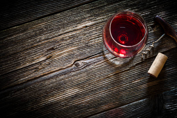 istock Wineglass, vintage corkscrew and cork stopper 1087803894