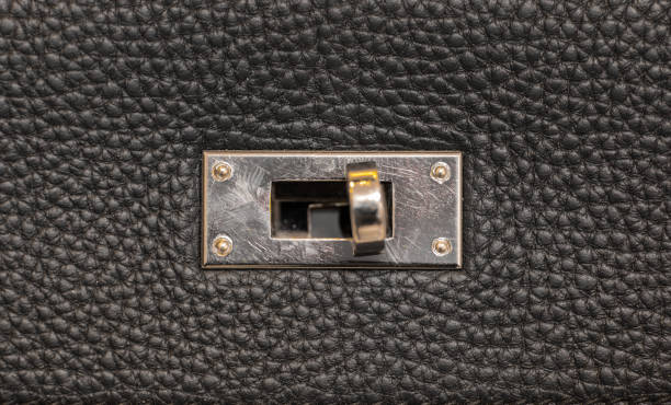 istock metal clasp on leather bag 1087809346