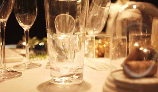 istock blur Many empty glasses on the table with still life pattern on a table against restaurant background.copy space 1087818206