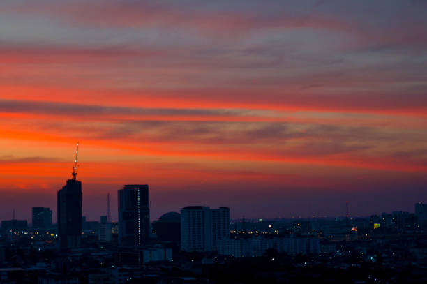 istock sunset and silhouette city 1087821582