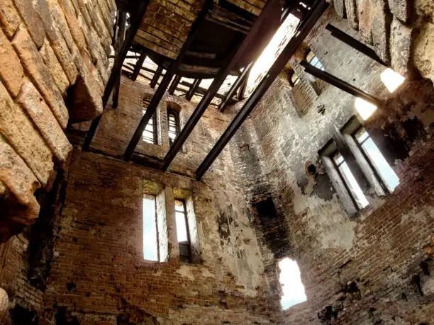 Photo of The interior of an old destroyedThe tower of the former city baths in Putivl (Sumy region, Ukraine)