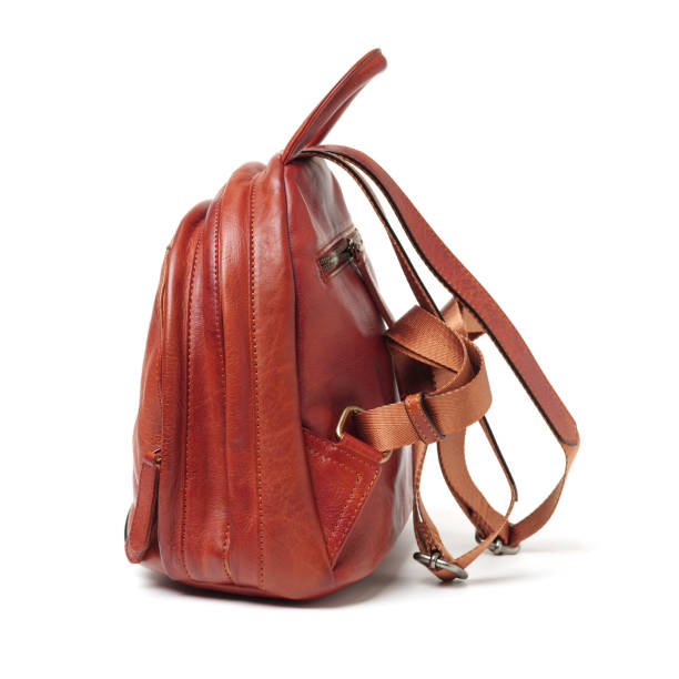 istock Brown female leather bag separated by white background 1087823568