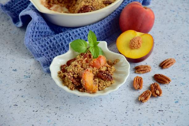 istock Peach pecan crumble garnish with mint leaf 1087827784