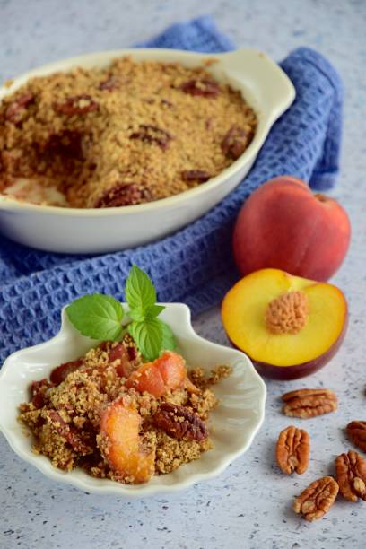 istock Peach pecan crumble garnish with mint leaf 1087827804
