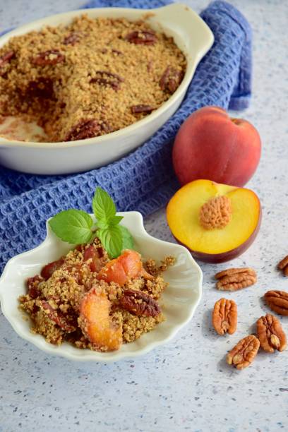 istock Peach pecan crumble garnish with mint leaf 1087827826