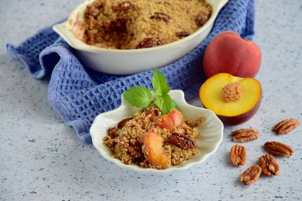 istock Peach pecan crumble garnish with mint leaf 1087827842