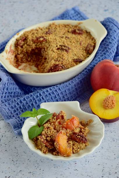istock Peach pecan crumble garnish with mint leaf 1087827884
