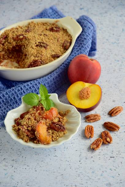 istock Peach pecan crumble garnish with mint leaf 1087827912