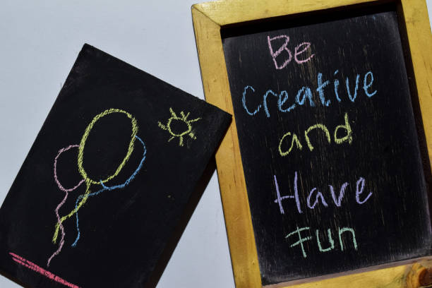 istock Be Creative and Have Fun on phrase colorful handwritten on blackboard 1087833418