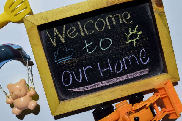 istock Welcome to Our Home on phrase colorful handwritten on blackboard 1087833456