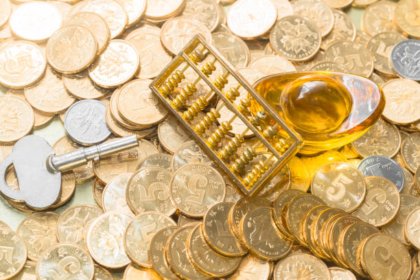 istock The gold abacus is placed on gold COINS 1087835426