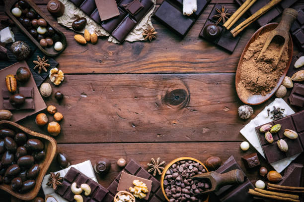 istock Assorted chocolate and home made cookies in old-fashioned style making a frame with copy space 1087839220