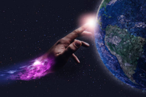 istock Forefinger touches a earth pixel in infinite space. Mixed Media. Concept matrix universe. 1087839346